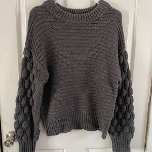 Trendy, detailed sweater